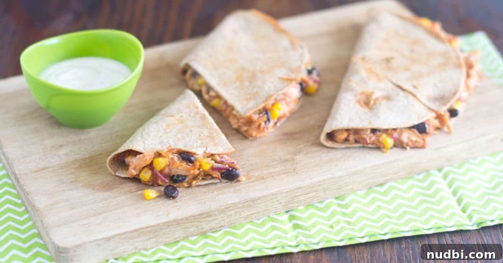 Chicken quesadillas on cutting board