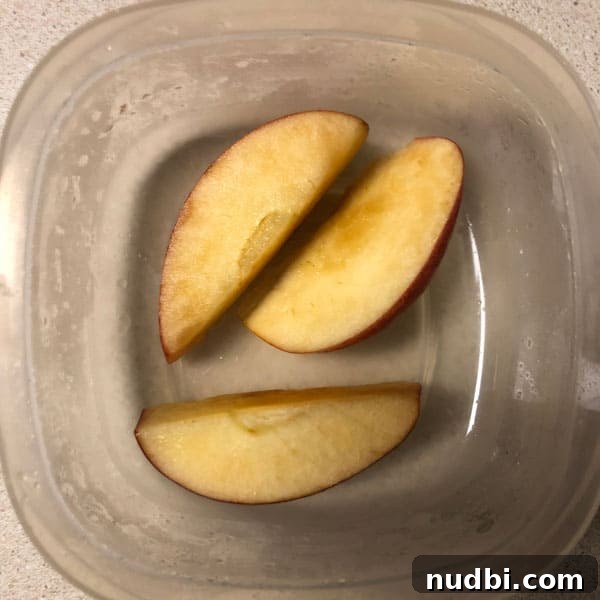Unlock the Secret to Browning-Proof Apples 3 Sliced apples in soda water to prevent browning