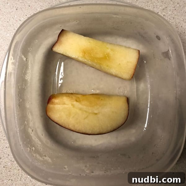 Unlock the Secret to Browning-Proof Apples 5 Sliced apples in salt water to prevent browning