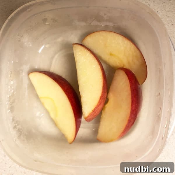 Unlock the Secret to Browning-Proof Apples 7 Sliced apples in apple juice to keep fresh