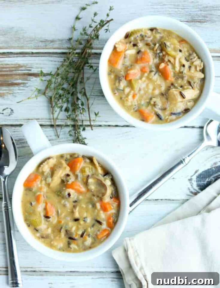 15 Delicious Ways to Reinvent Thanksgiving Leftovers 4 Comforting bowl of Leftover Turkey and Wild Rice Soup, perfect for a cold day.