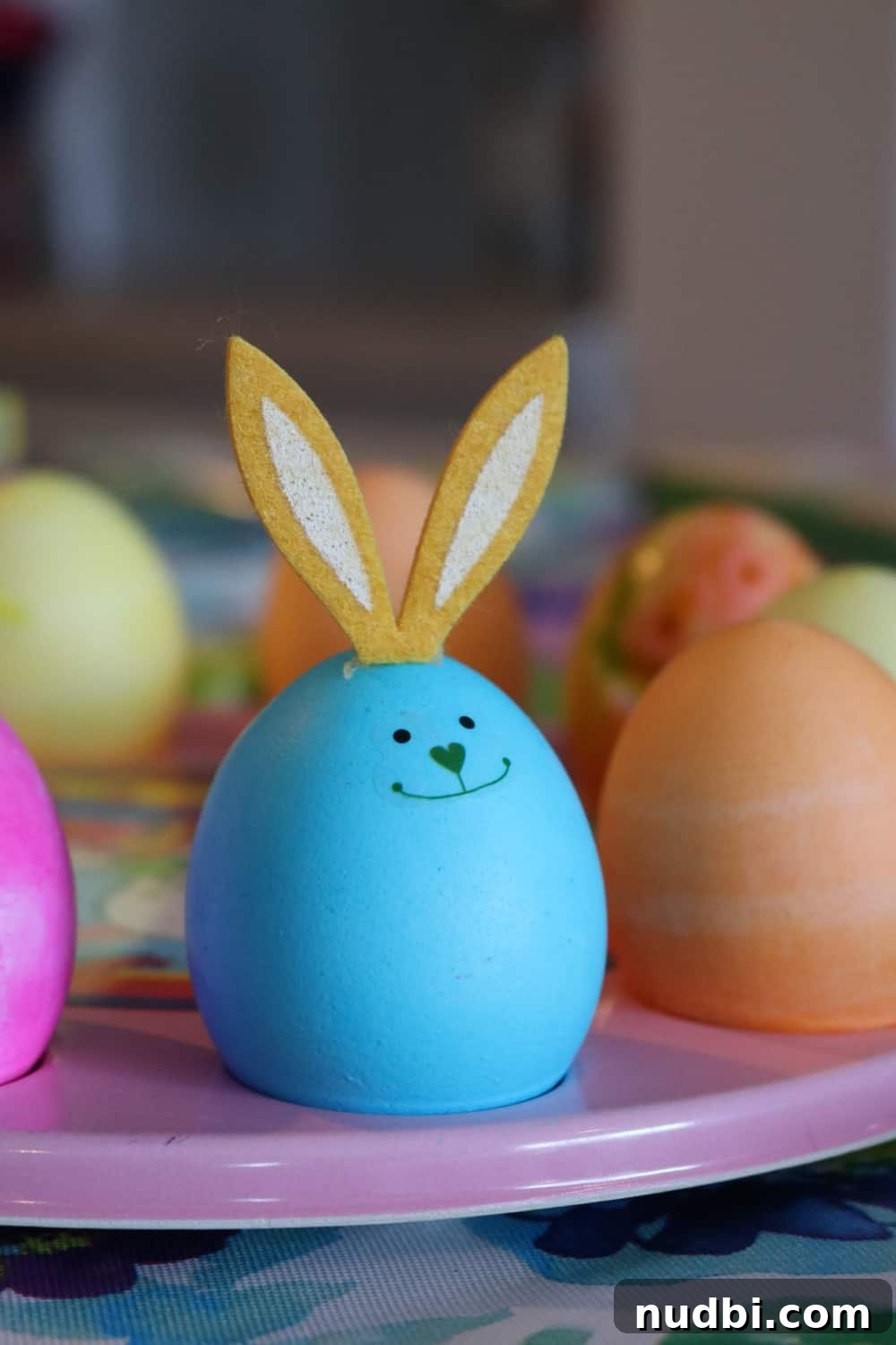 Colorful Easter eggs hidden in grass, ready for a fun Easter egg hunt, promoting active play.