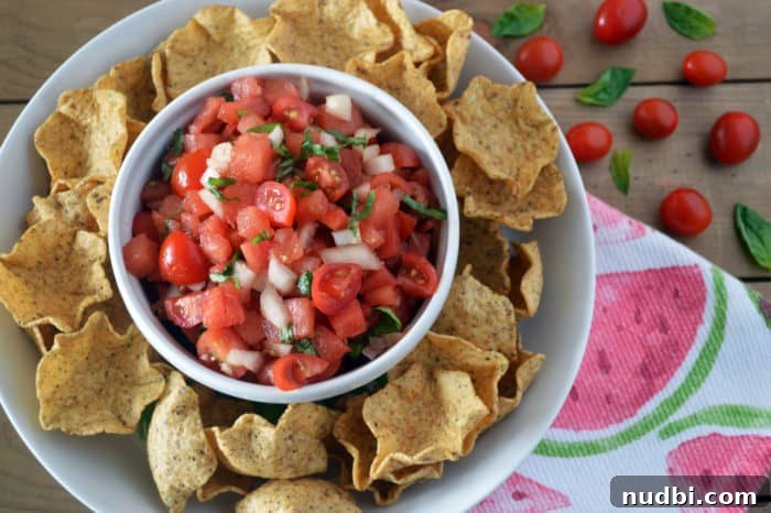 Sizzling Summer BBQ Inspirations 4 Refreshing watermelon salsa with fresh mint and lime, served in a vibrant bowl, perfect as a prepped appetizer.