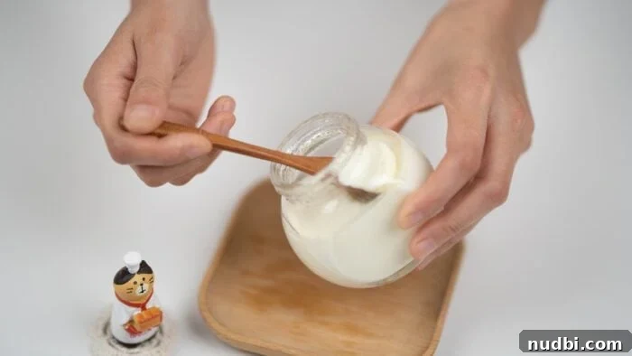 Coconut granola fruit cups with yogurt, highlighting fermented foods for gut health.