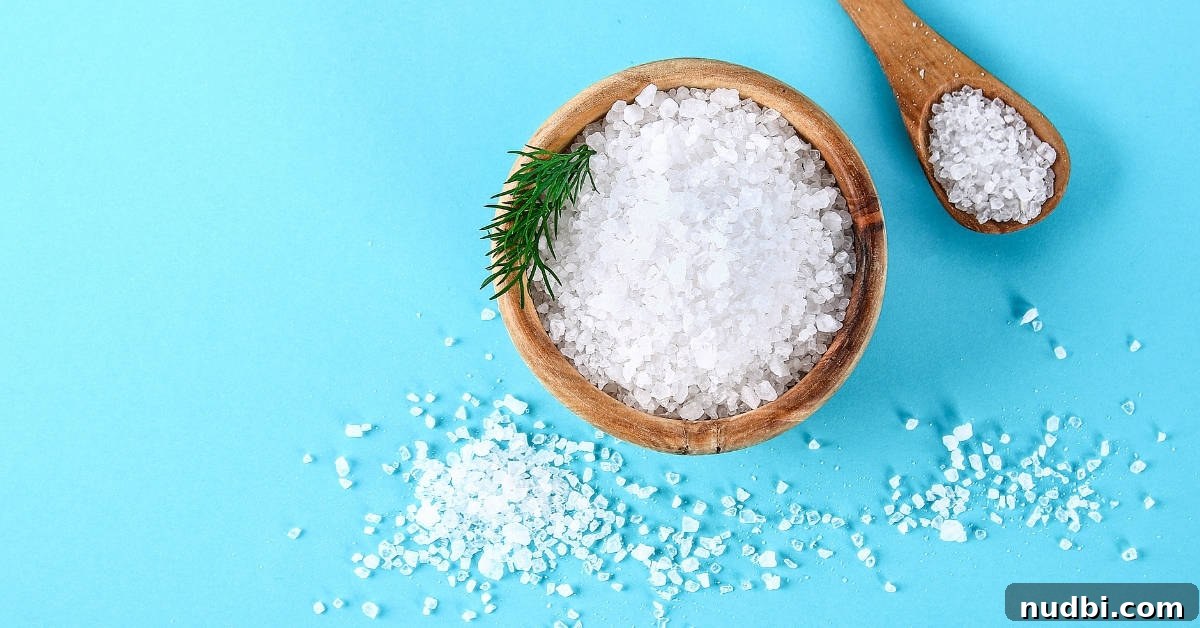 A hand reaching for a spice jar, encouraging the use of herbs and spices over salt for flavor.