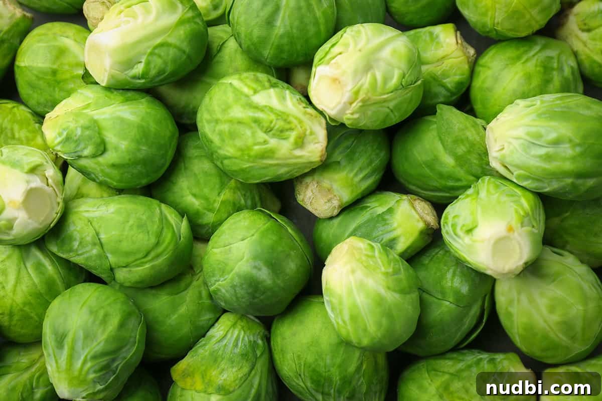 Fresh Brussels sprouts on a dark background