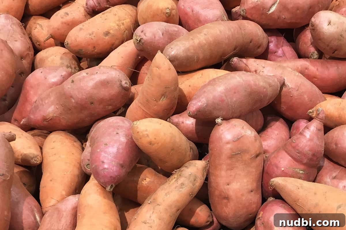Assortment of vibrant sweet potatoes