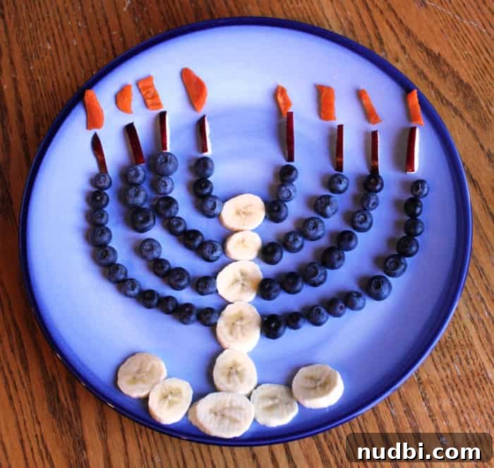Wholesome Hanukkah Feasting: Lightened Classics and New Favorites 3 A vibrant and healthy Fruit Menorah, perfect for a Hanukkah celebration