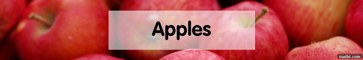 Fresh apples piled in a basket, highlighting their crisp and varied appeal.