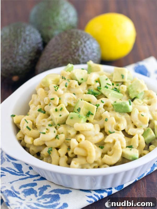 Green avocado mac and cheese in a bowl