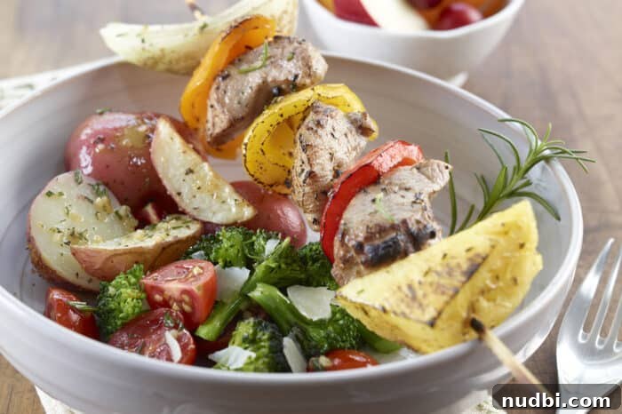 10 Summer Grilling Recipes You'll Crave All Season Long 12 Tropical Pineapple Pork Kabobs with onions and peppers, a perfect summer grilling recipe