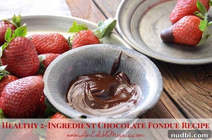 A bowl of dark chocolate fondue with fresh fruit for dipping, a healthy and indulgent dessert.