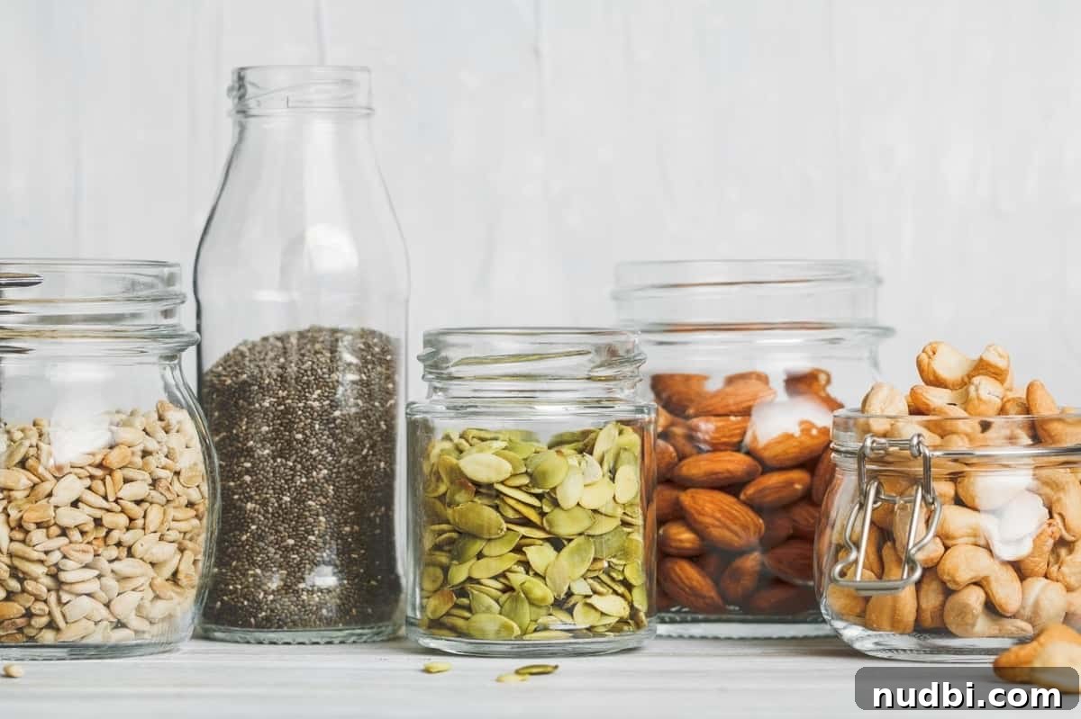 A mix of various nuts and seeds, illustrating beneficial snacks for anxiety.