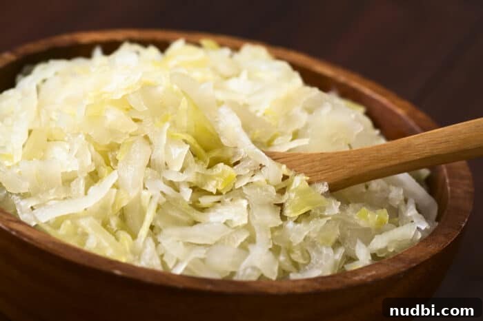 A vibrant bowl of sauerkraut, a fermented cabbage dish.