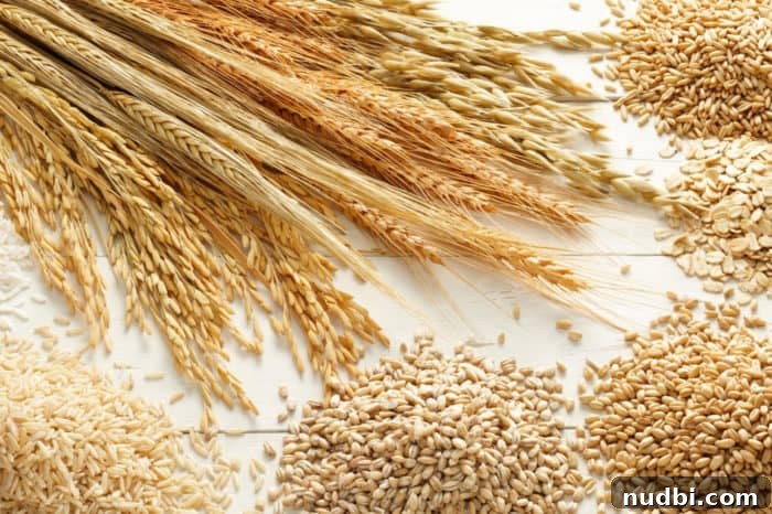 An assortment of whole grains, including oats, quinoa, and brown rice.