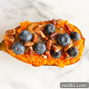 A vibrant Blueberry Maple Sweetpotato Breakfast Boat