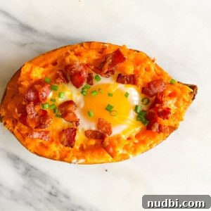 A savory Bacon, Egg, Cheese Sweetpotato Breakfast Boat