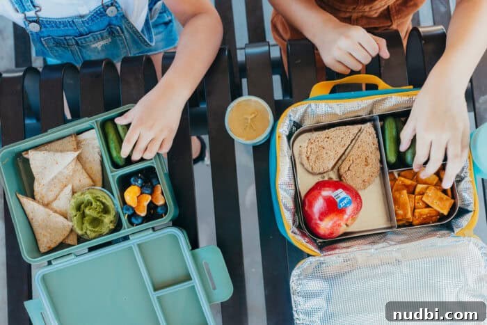 Happy family walking together, children carrying backpacks on their way to school
