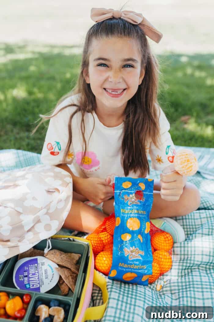 Bee Sweet Citrus mandarins with school supplies, promoting healthy lunchbox options.