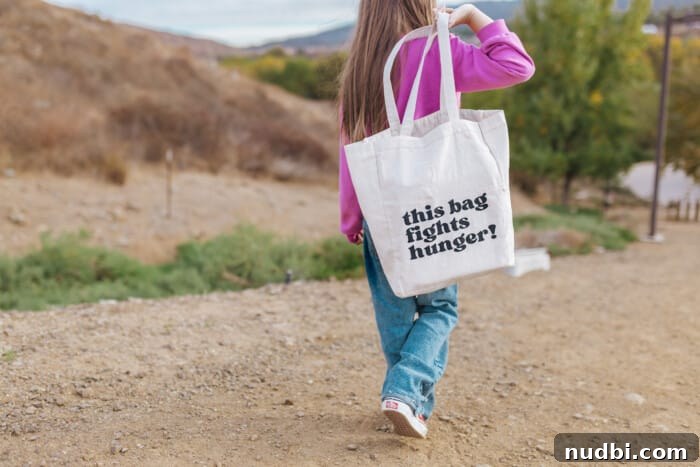 Cultivating Generosity A Season with Purpose 4 Carry the Cause tote bag in a community setting