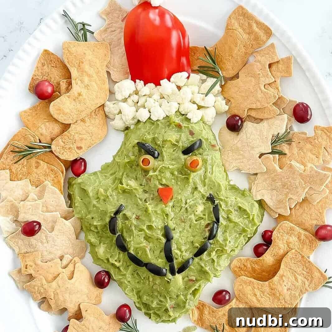 Guac Your Holidays Unexpected Festive Recipes 2 Festive Grinch Guacamole artfully arranged with holiday flair.