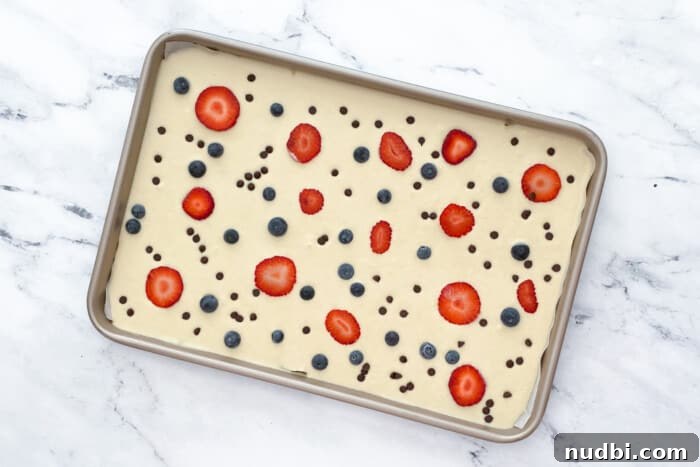 Sheet Pan Pancake mix and berries as toppings.