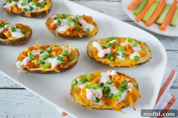 Spicy Buffalo Chicken Stuffed Potato Skins with blue cheese crumbles