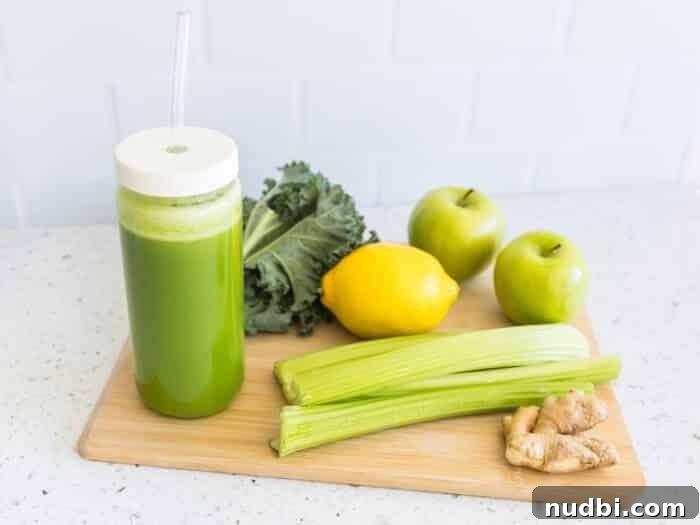 Ingredients for a green juice, including cucumbers, lemon, and ginger