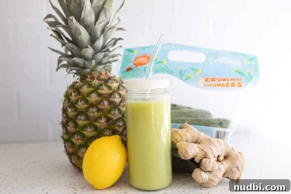 Pineapple mini cucumber green juice ingredients on a cutting board