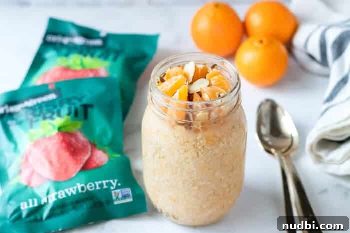 Refreshing Mandarin Overnight Oats in a clear mason jar for an easy breakfast