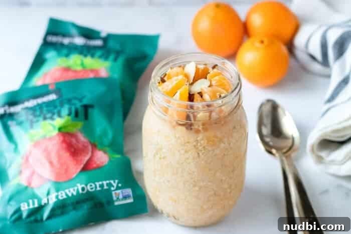 Mandarin Overnight Oats in a mason jar, an excellent egg-free breakfast option