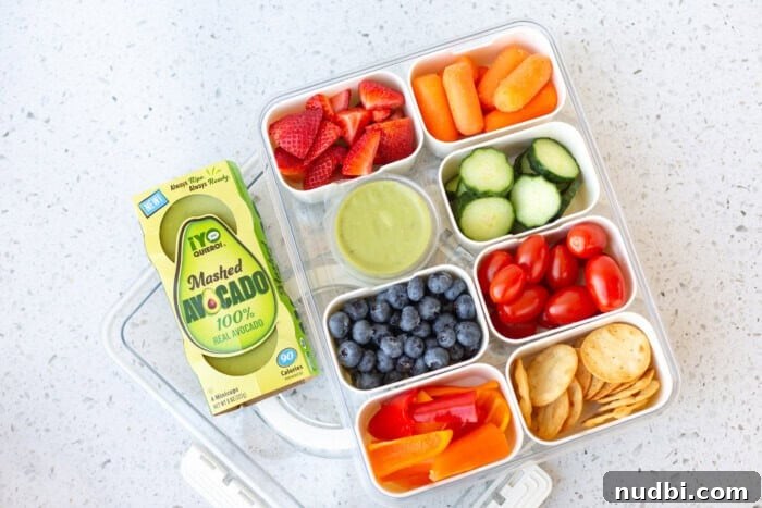 Getaway Grub Box 2 Colorful Snackle Box with fresh fruits, vegetables, and dips for spring break