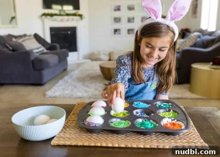 Three beautifully marbled Easter eggs, dyed with Cool Whip, showcasing unique patterns and vibrant colors.