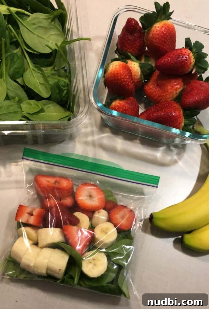 An assortment of colorful smoothie kits, prepped in bags for quick and healthy breakfasts.