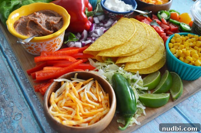 Close-up of a beautifully arranged taco board with various fresh ingredients, emphasizing healthy and vibrant choices for Cinco de Mayo.