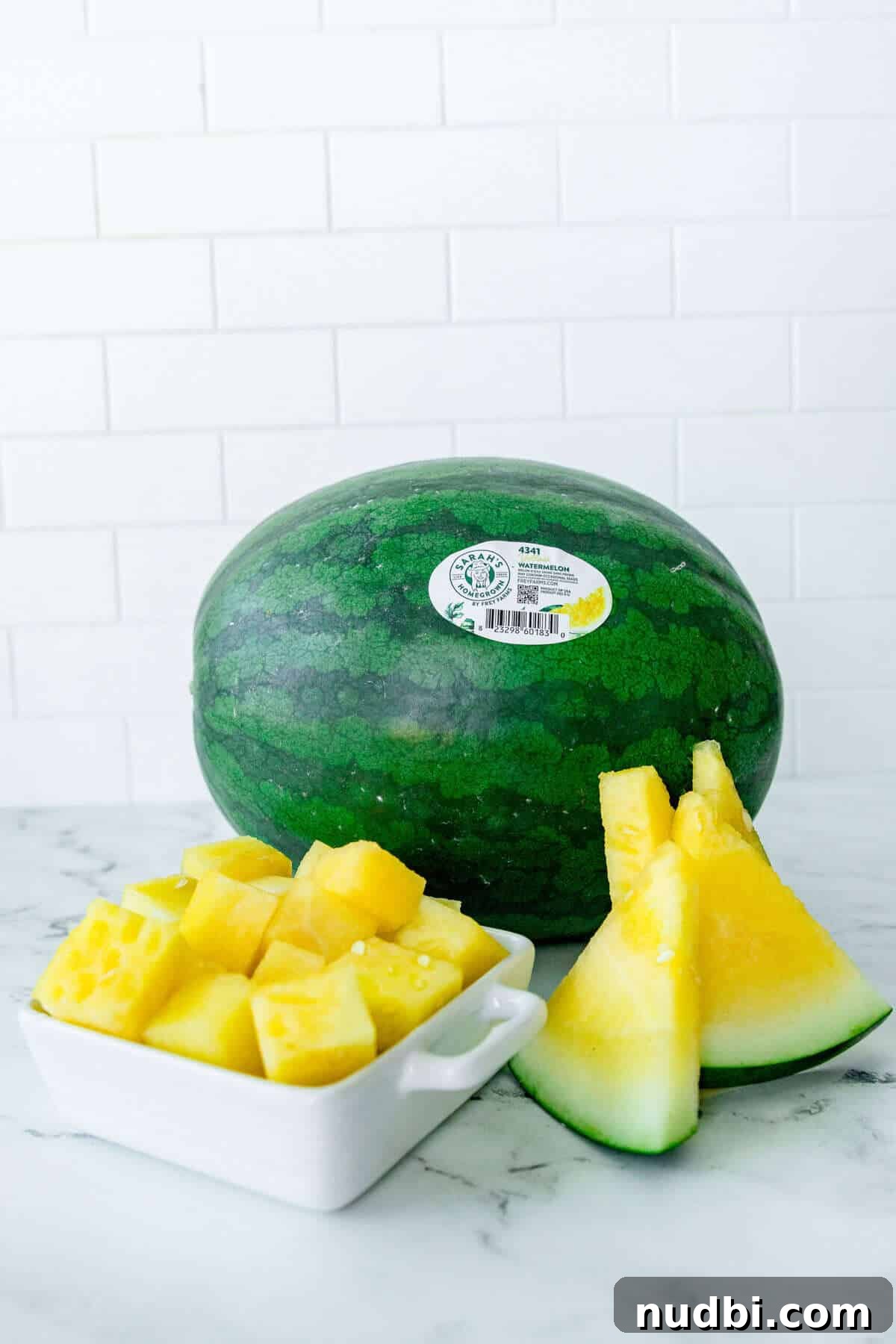 Yellow watermelon sliced and cubed for a fresh, hydrating summer snack. Whole yellow watermelon, sliced watermelon wedges, and cubed watermelon pieces showcasing the fruit’s golden interior and use as a sustainable summer snack.