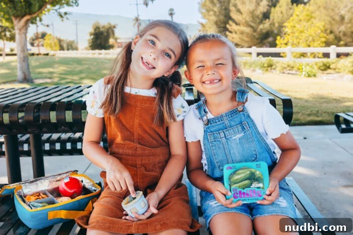 A mom packing Nature Fresh Farms Lil' Chills mini cucumbers into a lunchbox for back-to-school.