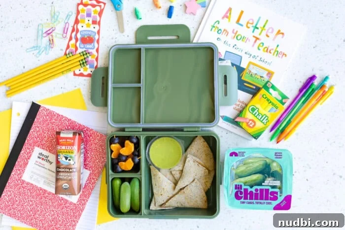 A child's hand reaching for Nature Fresh Farms Lil' Chills mini cucumbers from a bowl.