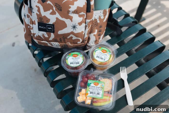 Smart Snacking: Fresh Fruit for Kids On The Go 3 A child happily selecting a Del Monte Grab and Go fresh fruit cup from the refrigerator.