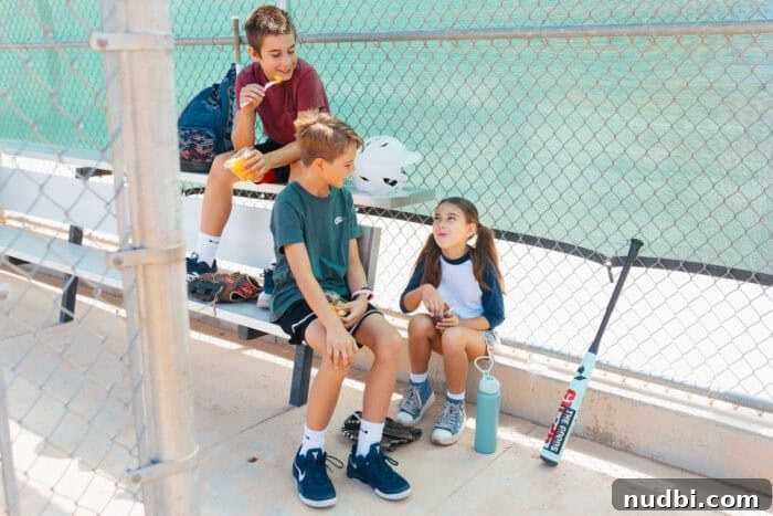 Smart Snacking: Fresh Fruit for Kids On The Go 8 A vibrant spread of various Del Monte Grab and Go fresh fruit snacks, promoting healthy eating for families.