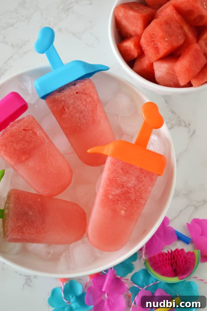 Refreshing Watermelon Lemonade Popsicles, a healthy dessert option.