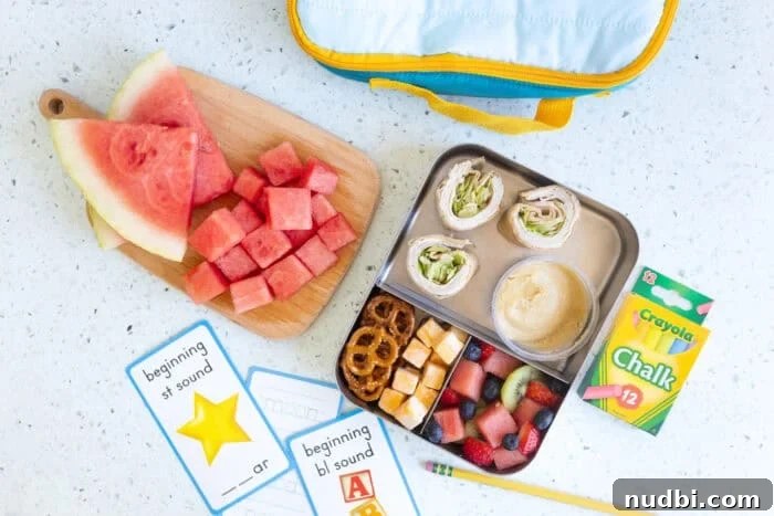 Neatly cut watermelon cubes, ready for lunchboxes or fruit salads.