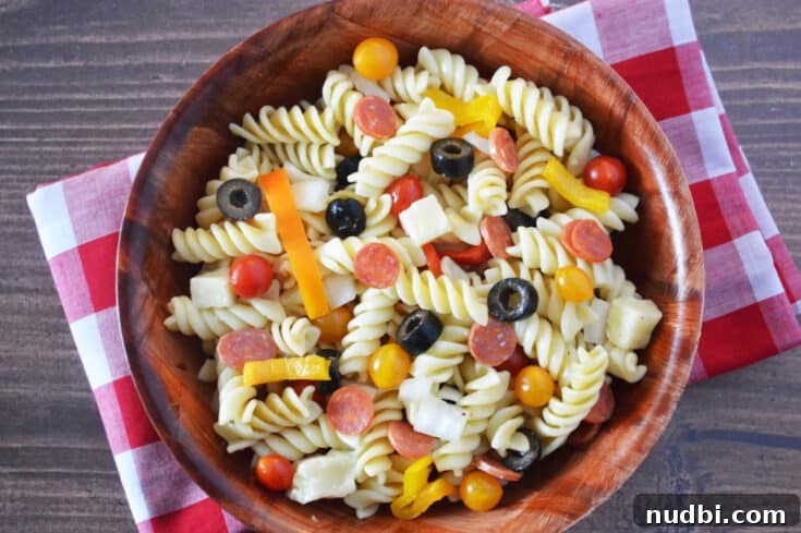 Pizza Pasta Salad Lunchbox, a colorful pasta salad with pizza toppings.