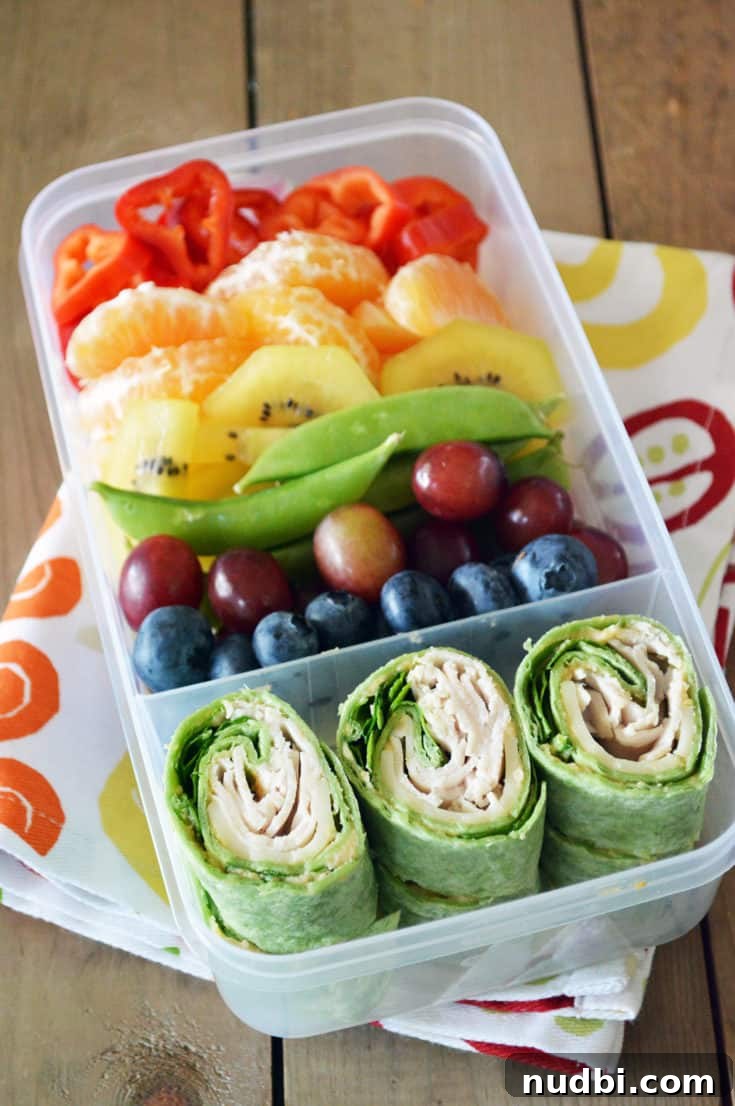 Rainbow Bento Box, featuring a colorful assortment of fruits and vegetables.
