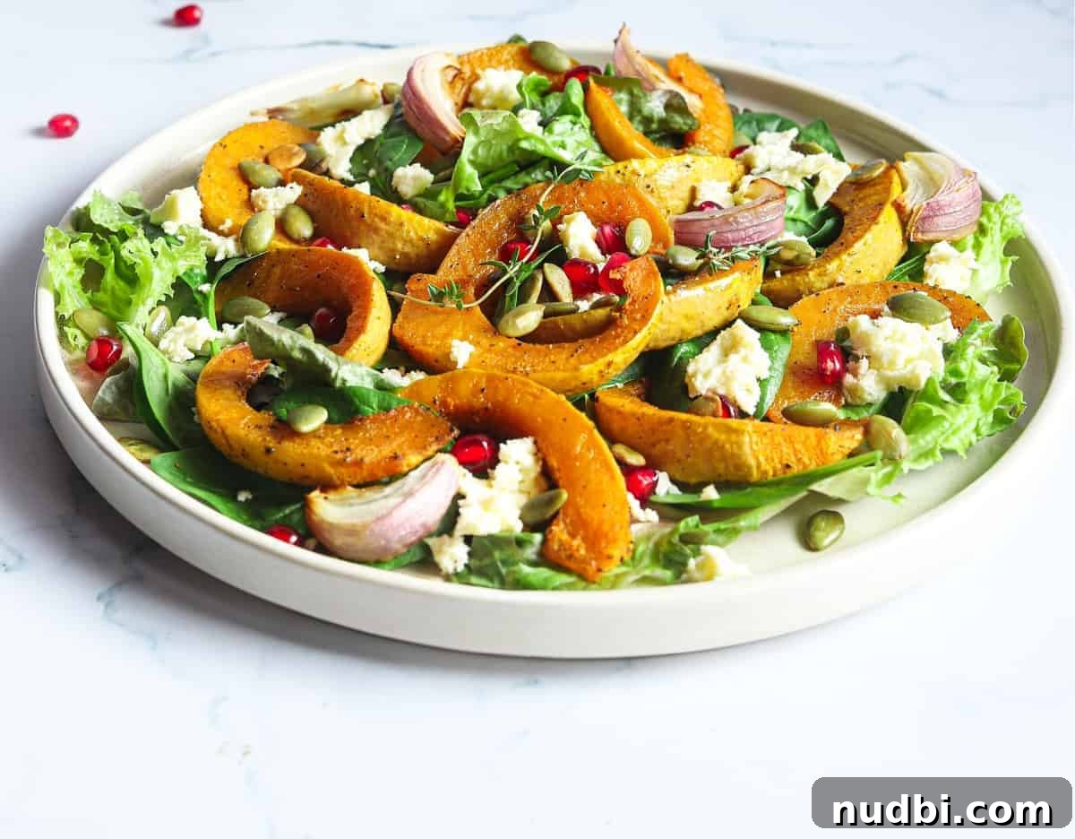 Tips for a Healthy New Year A vibrant roasted pumpkin salad, offering a visually appealing and healthy meal idea.
