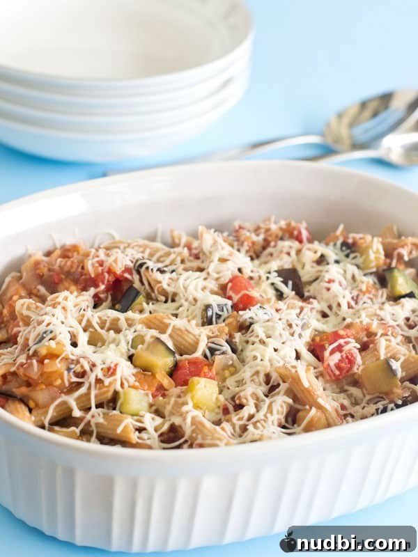 Cheesy Eggplant & Tomato Penne, a vibrant pasta dish.