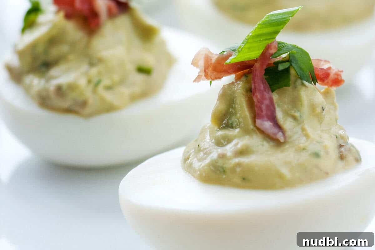 10 Healthy Egg Salad Recipes Using Leftover Easter Eggs A plate of healthy Avocado Deviled Eggs