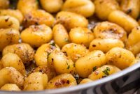Crispy Pan-Fried Gnocchi with Garlic Butter and Parmesan