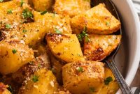 Crispy Parmesan-Crusted Potatoes with Garlic and Herbs