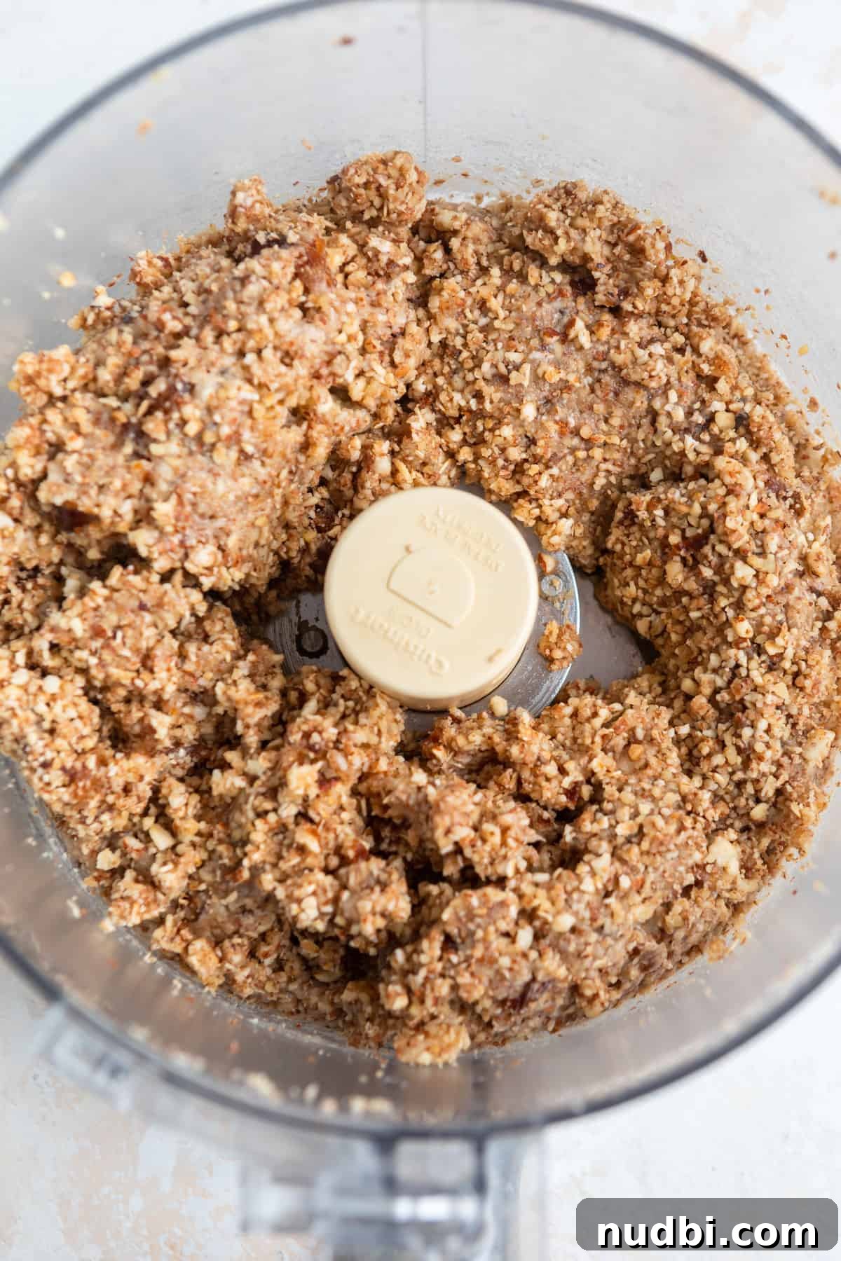 No-Bake Banana Bread Bites Recipe – Quick No-Oven Snack 7 Banana bread bite mixture in food processor.